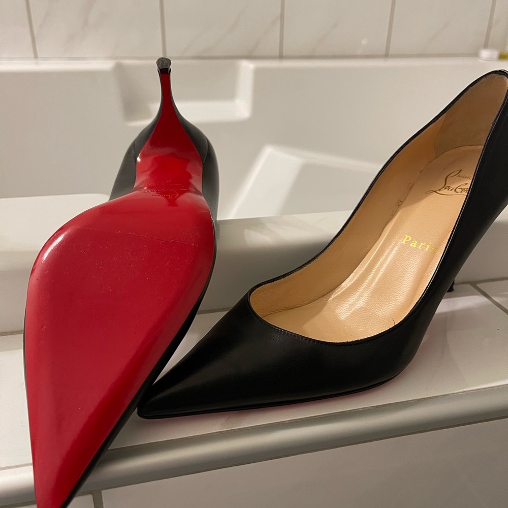 Christian Louboutin black pumps